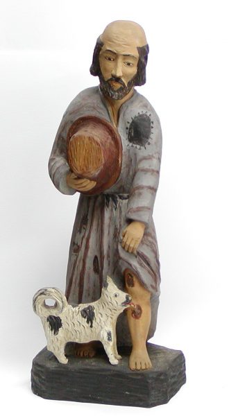 rzeźba św. Rocha w szarym stroju i psem u stóp liżącym mu ranę